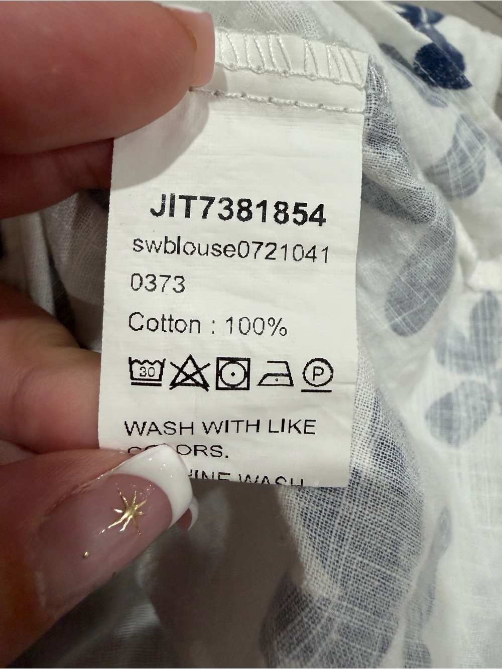 Women’s White Floral Short-Sleeve Blouse with Blue Print - Picture 4 of 4